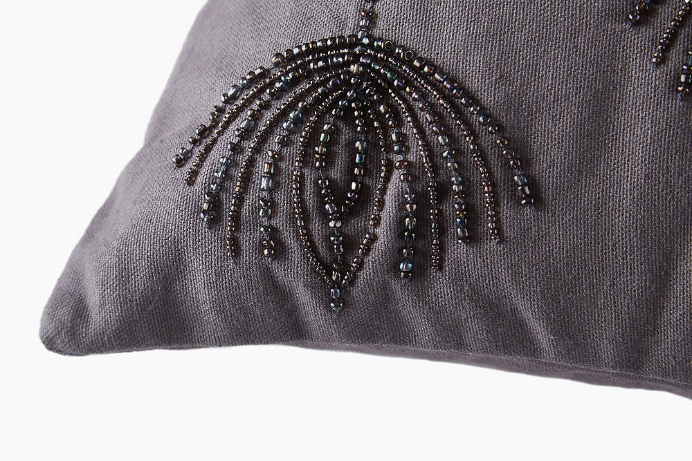 grey embroidered cushion 