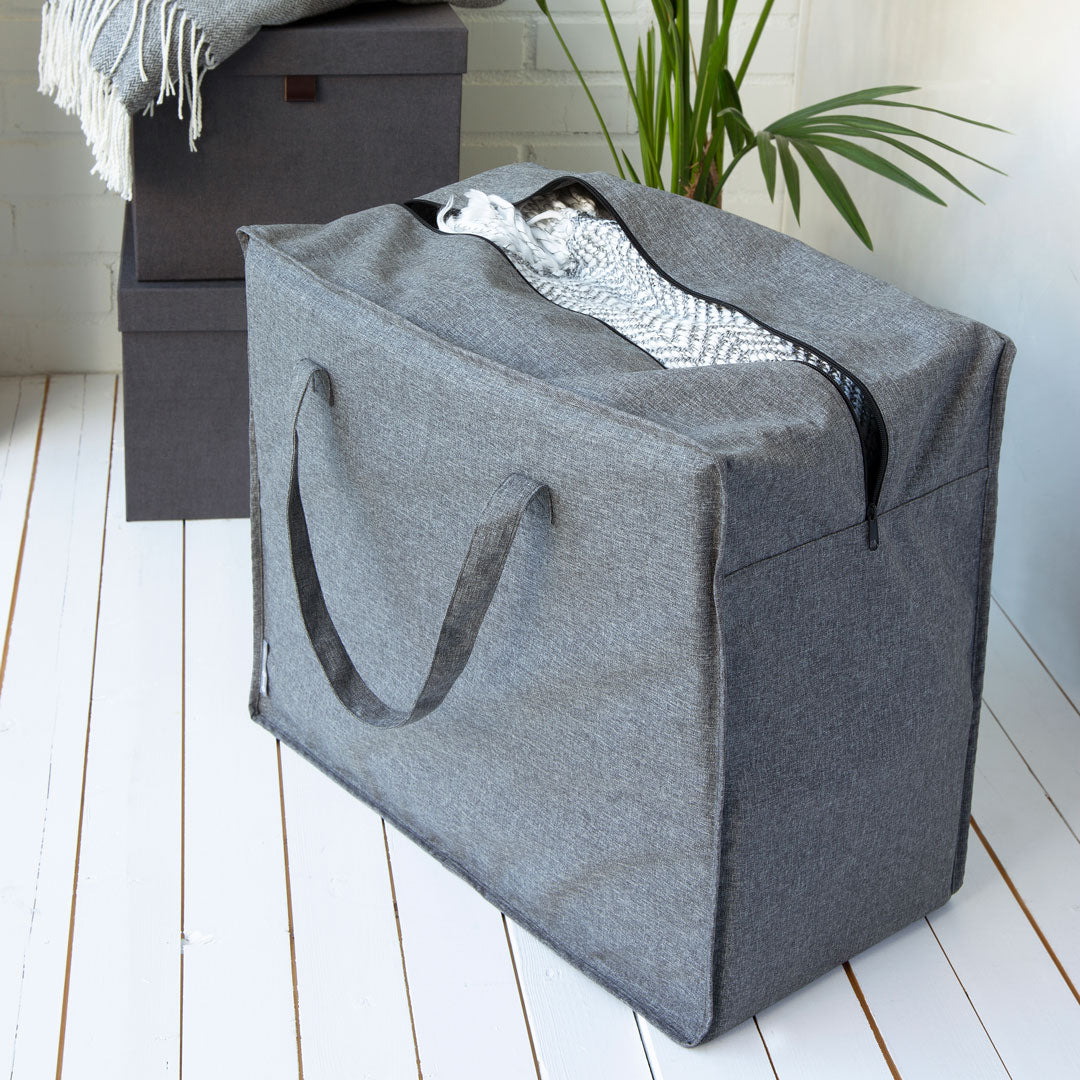Grey fabric storage bag by Bigso