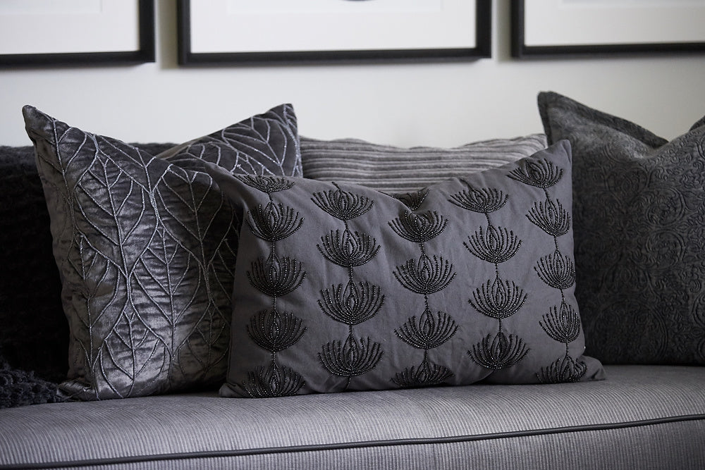 grey embroidered cushion 