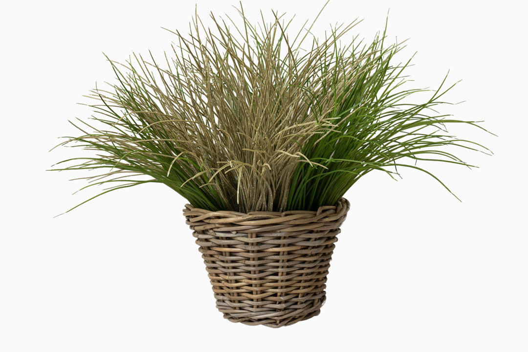 small woven round rattan basket with grasses
